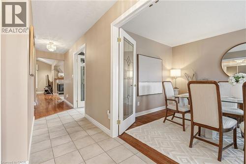 Double French Door Entry from the Foyer to the Dining Room - 1156 Augustus Drive, Burlington, ON - Indoor Photo Showing Other Room