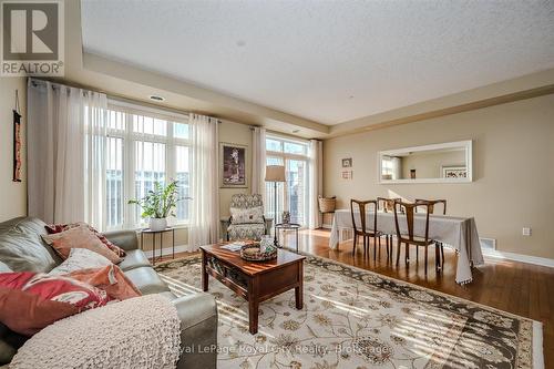 401 - 65 Bayberry Drive, Guelph (Village By The Arboretum), ON - Indoor Photo Showing Living Room