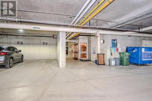 401 - 65 Bayberry Drive, Guelph (Village By The Arboretum), ON - Indoor Photo Showing Garage