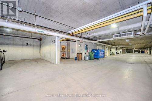 401 - 65 Bayberry Drive, Guelph (Village By The Arboretum), ON - Indoor Photo Showing Garage