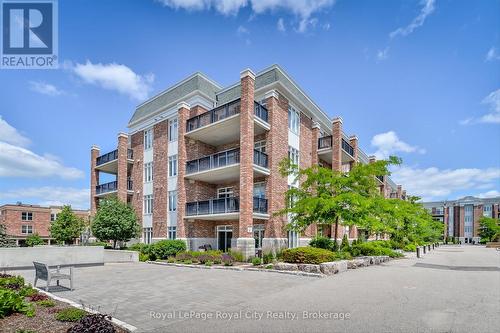 401 - 65 Bayberry Drive, Guelph (Village By The Arboretum), ON - Outdoor With Balcony With Facade