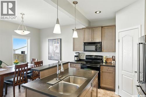 227 Galloway Road, Saskatoon, SK - Indoor Photo Showing Kitchen With Double Sink