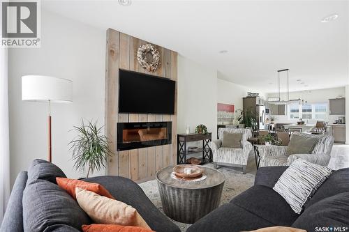 118 3Rd Street E, Saskatoon, SK - Indoor Photo Showing Living Room With Fireplace