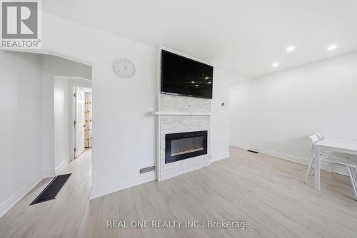 24 Sumach Street, Hamilton, ON - Indoor With Fireplace