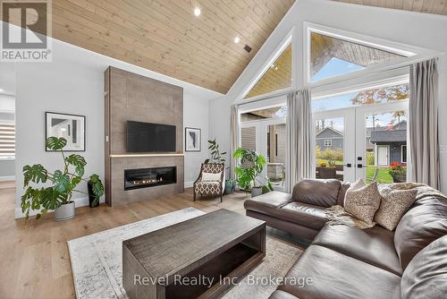 2 Seguin Crescent, Tiny, ON - Indoor Photo Showing Living Room With Fireplace