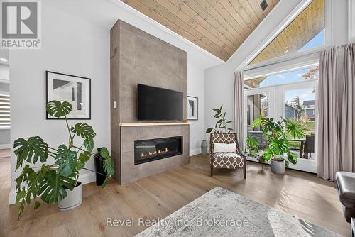 2 Seguin Crescent, Tiny, ON - Indoor Photo Showing Living Room With Fireplace
