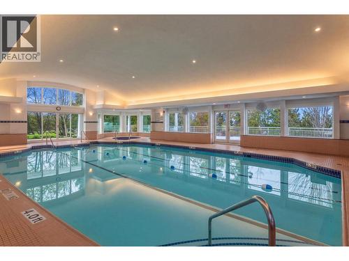 3925 Gallaghers Circle, Kelowna, BC - Indoor Photo Showing Other Room With In Ground Pool