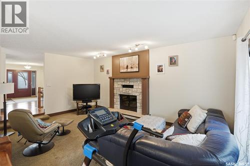 301 Coldspring Crescent, Saskatoon, SK - Indoor Photo Showing Living Room With Fireplace