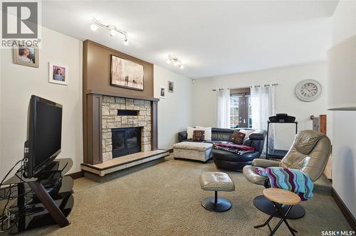 301 Coldspring Crescent, Saskatoon, SK - Indoor Photo Showing Living Room With Fireplace