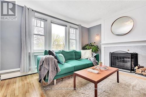 48 Hawthorne Avenue, Ottawa, ON - Indoor Photo Showing Living Room With Fireplace