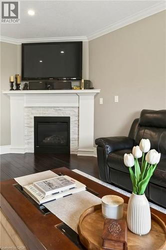 12 Aries Court, Hamilton, ON - Indoor Photo Showing Living Room With Fireplace