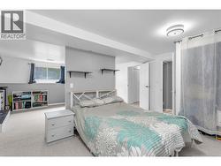 Add a short wall and a door and separate this bedroom into two spaces - 