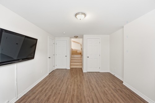 Salle familiale - 3998 Rue Mousseau, L'Assomption, QC - Indoor Photo Showing Other Room