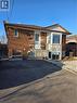 The property features a brick exterior with stone accents and a bay window - 62 Richwill Road Unit# Upper, Hamilton, ON  - Outdoor 