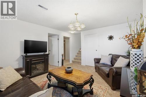 6 80 Berini Drive, Saskatoon, SK - Indoor Photo Showing Living Room With Fireplace