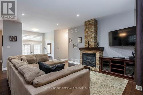 79 Forest Circle, Tiny, ON - Indoor Photo Showing Living Room With Fireplace