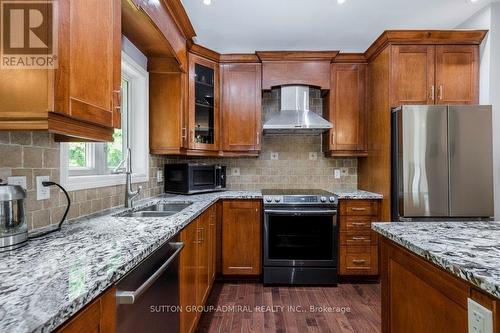 79 Forest Circle, Tiny, ON - Indoor Photo Showing Kitchen With Double Sink