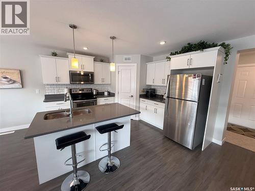 1061 Kolynchuk Crescent, Saskatoon, SK - Indoor Photo Showing Kitchen With Stainless Steel Kitchen