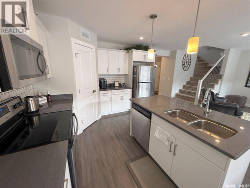 1061 Kolynchuk Crescent, Saskatoon, SK - Indoor Photo Showing Kitchen With Stainless Steel Kitchen With Double Sink
