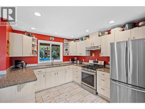 granite counters - 2015 Valleyview Drive, Kamloops, BC - Indoor Photo Showing Kitchen With Double Sink
