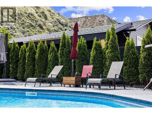 Pool side - 2015 Valleyview Drive, Kamloops, BC - Outdoor With In Ground Pool