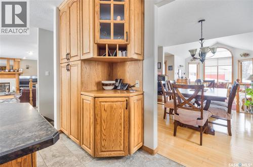 645 Aaron Drive, Prince Albert, SK - Indoor Photo Showing Dining Room With Fireplace