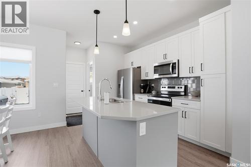 1047 Brighton Gate, Saskatoon, SK - Indoor Photo Showing Kitchen With Stainless Steel Kitchen With Upgraded Kitchen