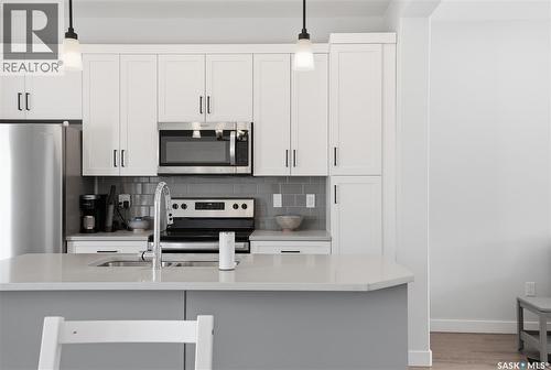 1047 Brighton Gate, Saskatoon, SK - Indoor Photo Showing Kitchen With Stainless Steel Kitchen With Upgraded Kitchen