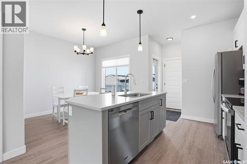 1047 Brighton Gate, Saskatoon, SK - Indoor Photo Showing Kitchen With Stainless Steel Kitchen With Double Sink With Upgraded Kitchen