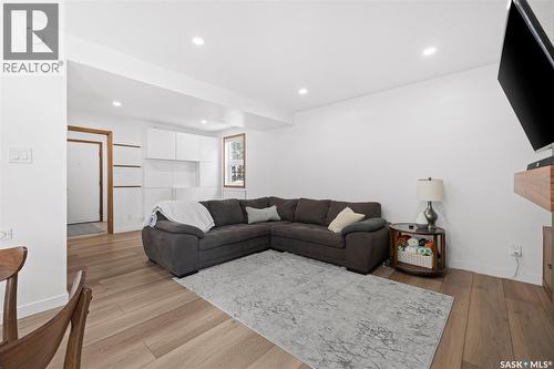 2002 Braun Bay E, Regina, SK - Indoor Photo Showing Living Room With Fireplace