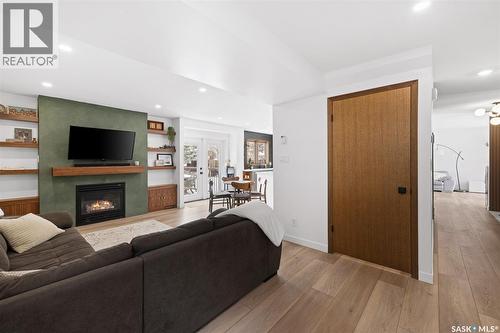 2002 Braun Bay E, Regina, SK - Indoor Photo Showing Living Room With Fireplace