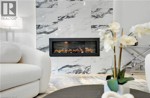 239 Corrie Crescent, Waterloo, ON - Indoor Photo Showing Living Room With Fireplace