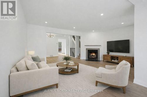 4 Marielle Court, Ottawa, ON - Indoor Photo Showing Living Room With Fireplace