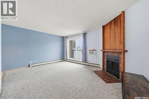 205 855 Wollaston Crescent, Saskatoon, SK - Indoor With Fireplace