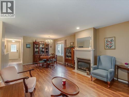 7136 Wright Way, Trail, BC - Indoor Photo Showing Living Room With Fireplace