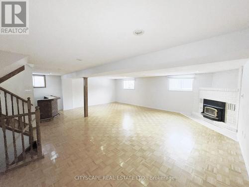Lower Level Family/Rec Room - 7 Quincy Court, Hamilton, ON - Indoor With Fireplace