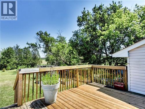 Spacious outdoor wood deck with natural wood railing, offering expansive open-air enjoyment - 9183 Silver Street, Caistor Centre, ON - Outdoor With Deck Patio Veranda With Exterior