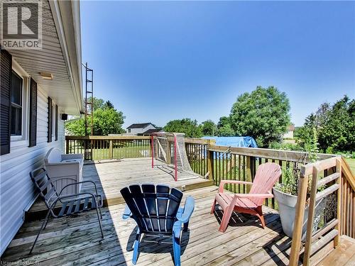 Expansive wood deck with full railing system, offering exterior access and outdoor living space - 9183 Silver Street, Caistor Centre, ON - Outdoor With Deck Patio Veranda With Exterior