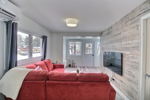 Salon - 230 11E Rue, Val-D'Or, QC - Indoor Photo Showing Living Room With Fireplace