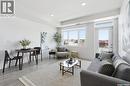 211 770 Childers Crescent, Saskatoon, SK  - Indoor Photo Showing Living Room 