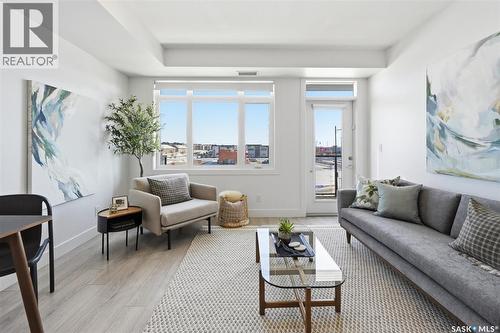 211 770 Childers Crescent, Saskatoon, SK - Indoor Photo Showing Living Room