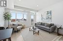 211 770 Childers Crescent, Saskatoon, SK  - Indoor Photo Showing Living Room 