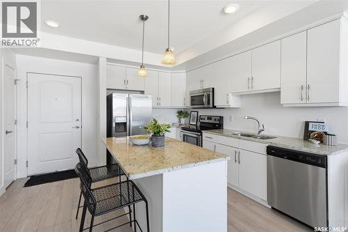 211 770 Childers Crescent, Saskatoon, SK - Indoor Photo Showing Kitchen With Stainless Steel Kitchen With Double Sink With Upgraded Kitchen