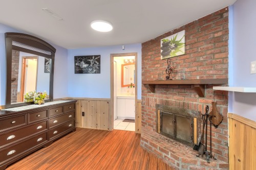 Bedroom - 5715 Boul. Payer, Longueuil (Saint-Hubert), QC - Indoor Photo Showing Other Room With Fireplace