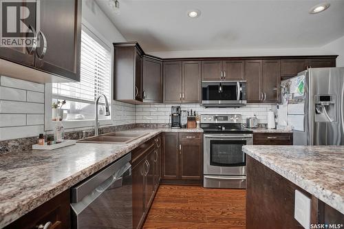 158 Cornish Road, Saskatoon, SK - Indoor Photo Showing Kitchen With Double Sink