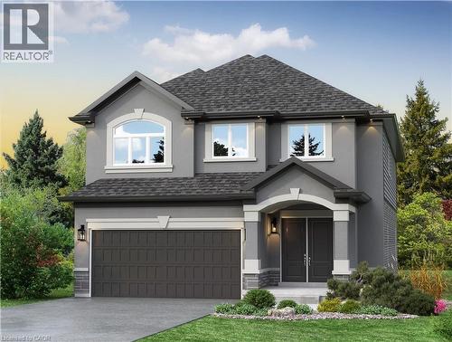 The property features a two-story exterior with a covered porch entrance, an attached garage, and a well-maintained front yard with landscaping - Lot 9 Kellogg Avenue, Hamilton, ON - Outdoor With Facade