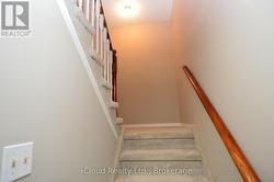 STAIRS TO FINISHED BASEMENT - 