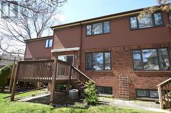 DECK WITH AWNING FOR THOSE SUNNY SUMMER DAYS - 