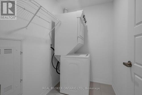 In-suite laundry - 412 - 3265 Carding Mill Trail, Oakville, ON - Indoor Photo Showing Laundry Room