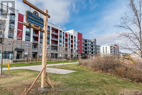 412 - 3265 Carding Mill Trail, Oakville, ON - Outdoor With Balcony With Facade
